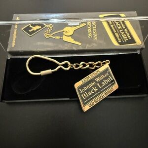 Black Label Gold Keychain this s a Jonnie Walker Black. It’s new